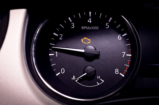 Check Engine Light service in Newport, NH by Promex Auto. Image of Check Engine Light on a Car Dashboard illuminated indicating the need for diagnostic service.